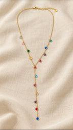 Avelina multicolour gold Y necklace on linen