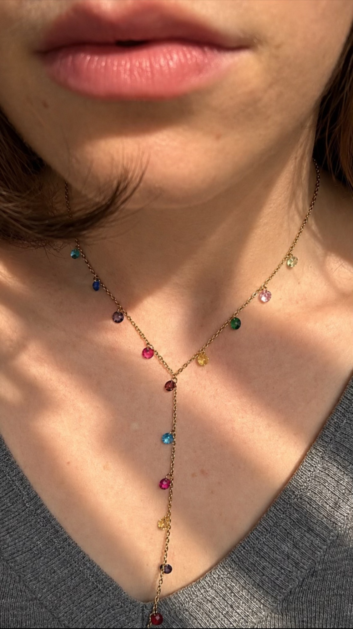 Avelina multicolour gold Y necklace worn