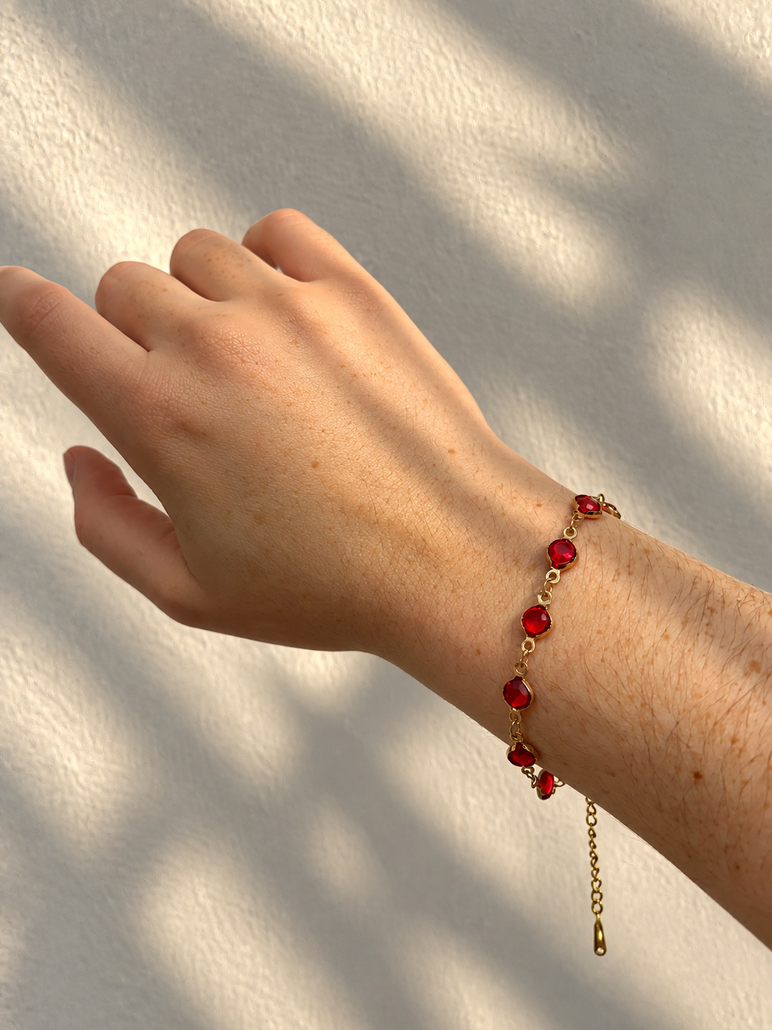 Bellarosa Bracelet worn with red stones