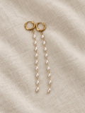 Soreina gold hoop earrings with long pearl-look bead strands
