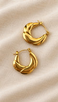 Tressa Earrings – gold twisted sculptural hoop earrings